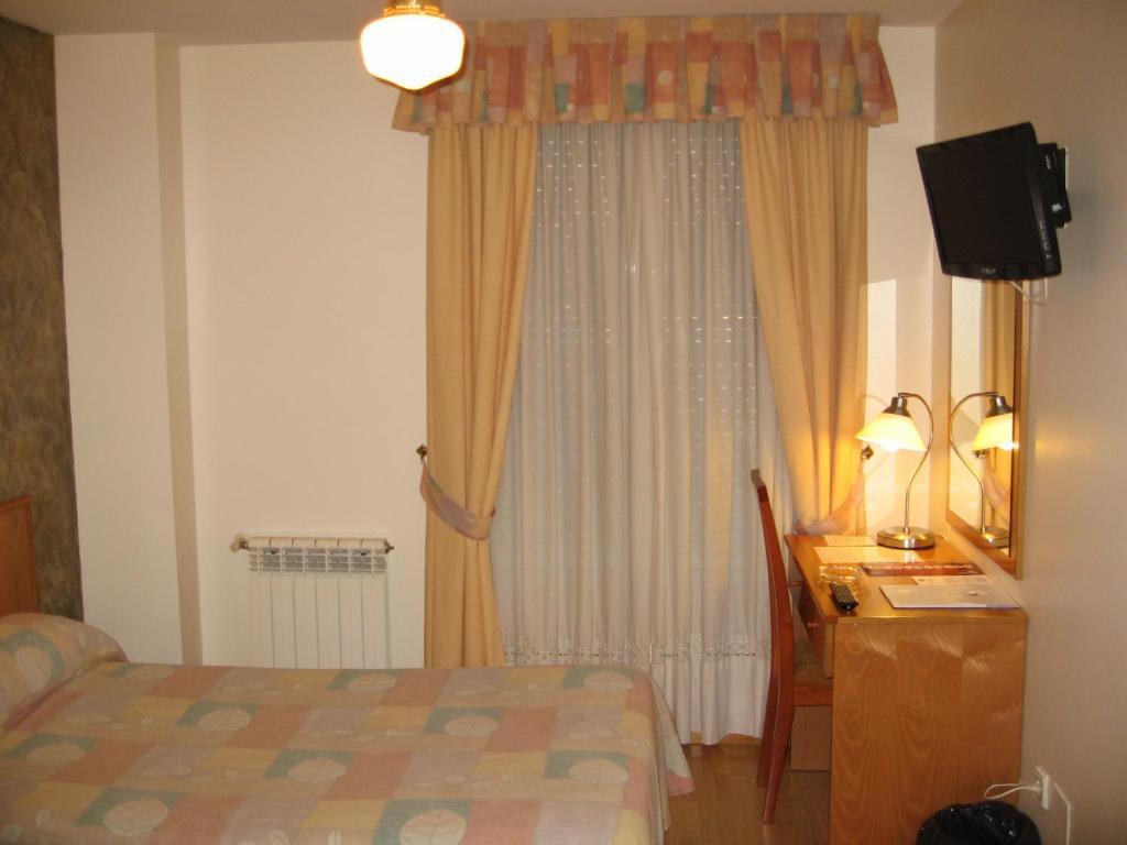 Hotel Camargo Igollo Rum bild